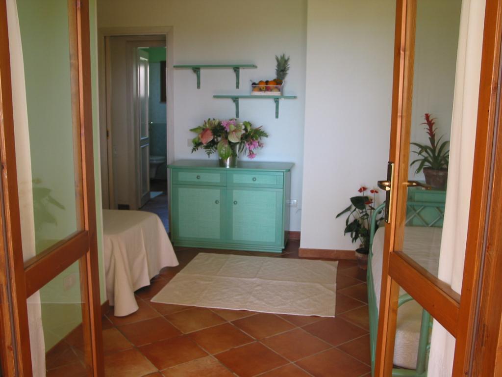 Villaggio Piscina Rei Monte Nai Rum bild